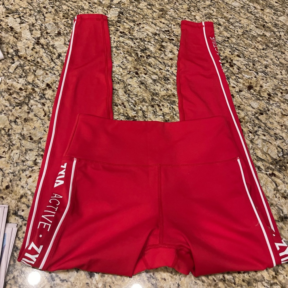 Zyia full length high waist legging with logo.